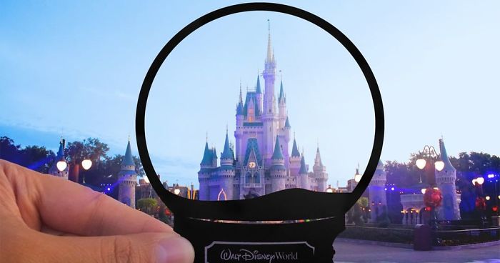 I Travel Around Disneylands Around The World To Hold Up Paper Cut-Outs Of Famous Characters And Scenes (86 Pics)