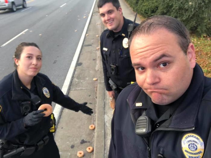 Police Officers Investigate A Krispy Kreme Truck That Spilled Donuts All Over The Road, Crack People Up With Their Hilarious Report