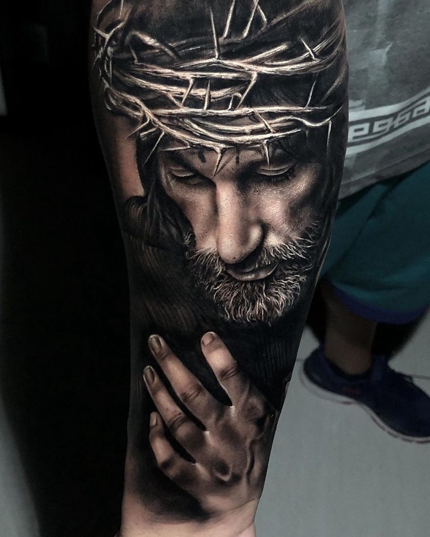 Masculine tattoo design featuring a detailed portrait of a bearded man with a crown of thorns.