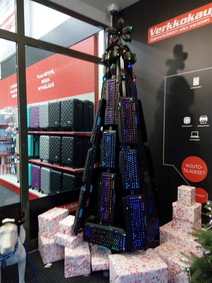 Christmas Tree At A Local Electronics Store Is Lit