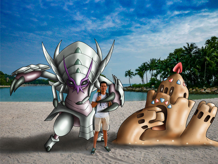 Person poses with Pokémon illustrations on a sunny beach.
