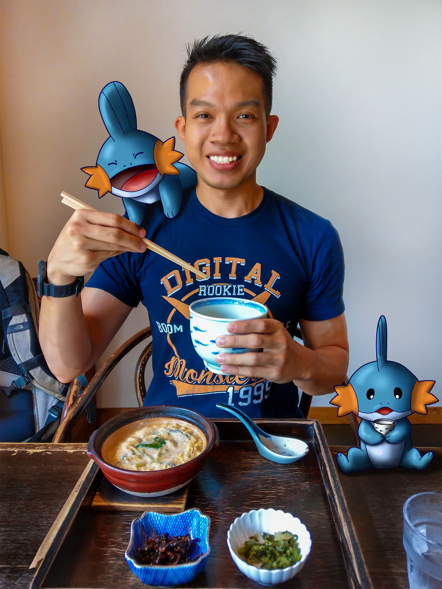 Man dining with Pokémon illustrations beside him in a casual setting.