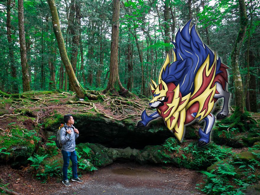 A person encounters a large Pokémon illustration in a forest setting, blending fantasy with real-world scenery.