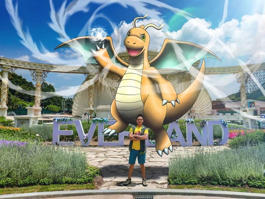 Illustration of a Pokémon integrated into a theme park photo, featuring a large dragon character above a person.