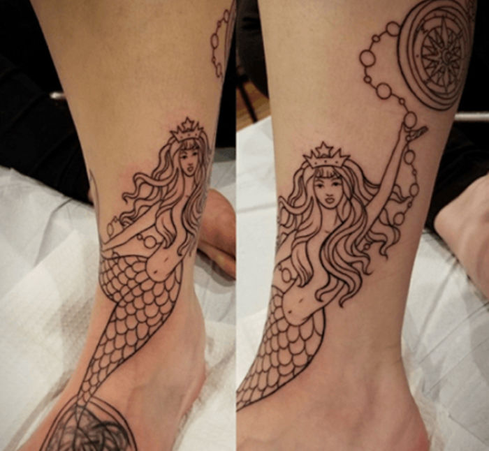 Starbucks tattoos featuring a mermaid design inked on legs, showcasing intricate line work and detailed artistry.