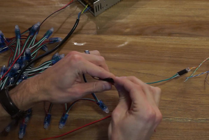 Engineer Shares A Video Of Christmas Tree Lights Turned Into A Snake Game Controlled With PS4 Controller