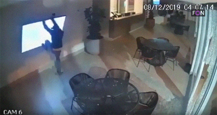 Security Camera Captures Unique Footage Of Thieves Failing So Hard It Looks Like A '90s Comedy Movie