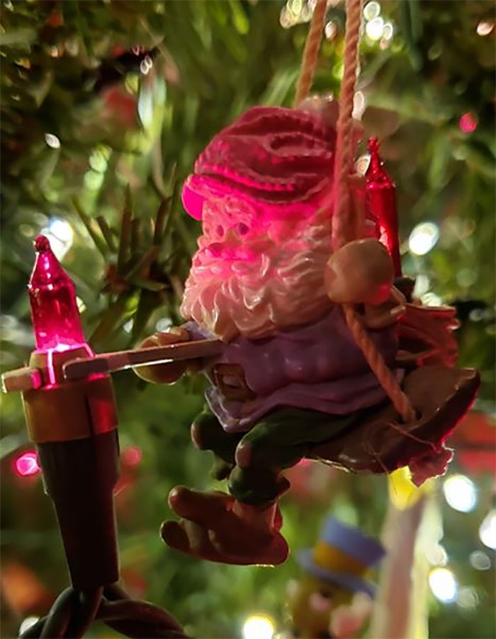 This My Little Friend. He Goes Around Fixing All The Broken Lights On The Tree. He Is Very Helpful And Kind