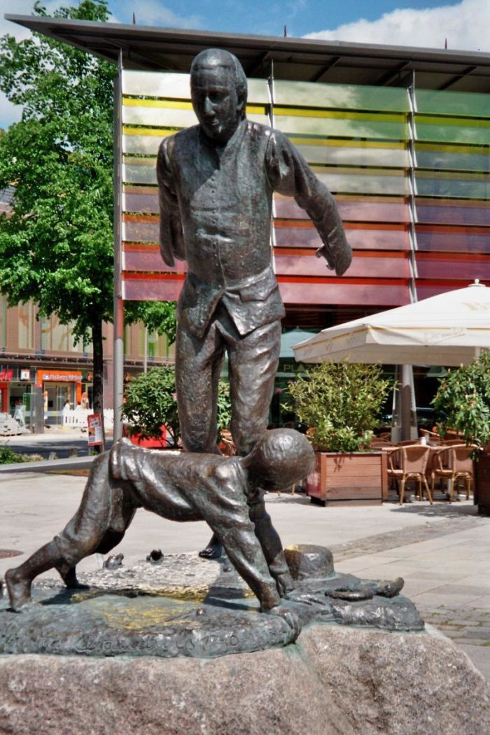 This Skulpture Near My School Looks Like That Dude Is Boutta Yeet That Child Into Another Continent