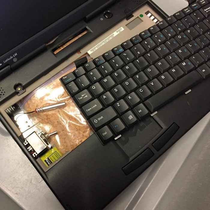 This Image Is An Inert Replica Of A Laptop Bomb. What Looks Like Cereal In The Baggie Is Actually Inert Dynamite Flakes