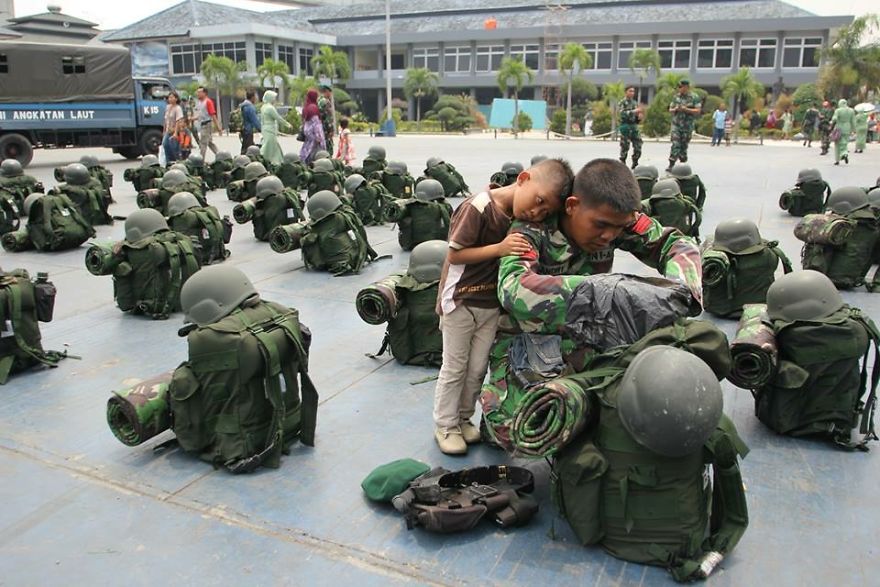A Soldier And His Son Before Leaving For Duty