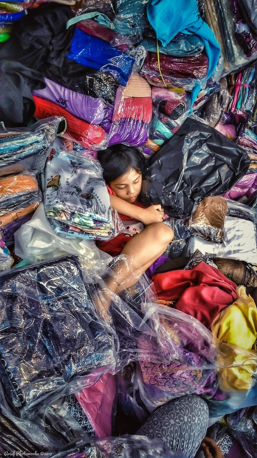 Child Playing In Her Parents' Merchandise