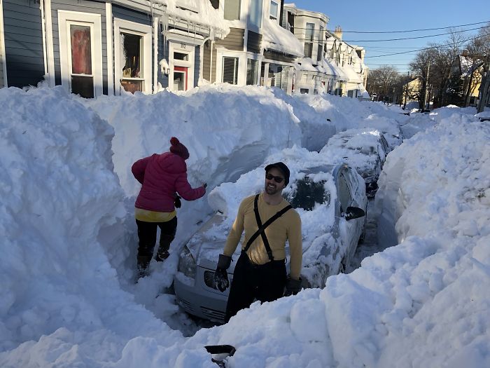 Cars Are Slowly Emerging From Under The Snow. People In The Neighbourhood Stopping By To Help People Who Are Buried