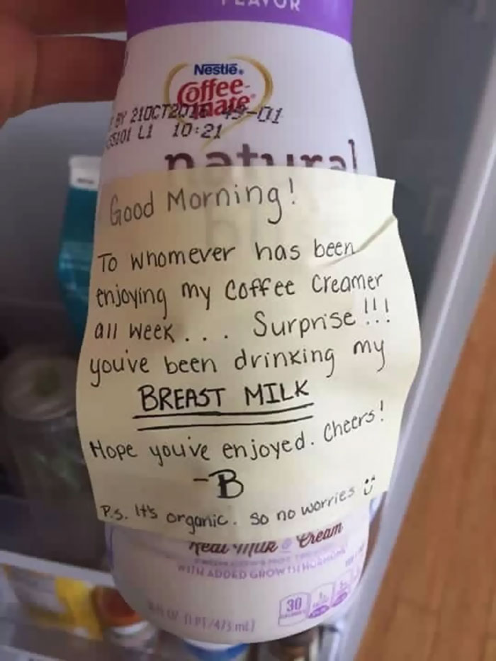 Milk bottle with a funny message attached on paper 