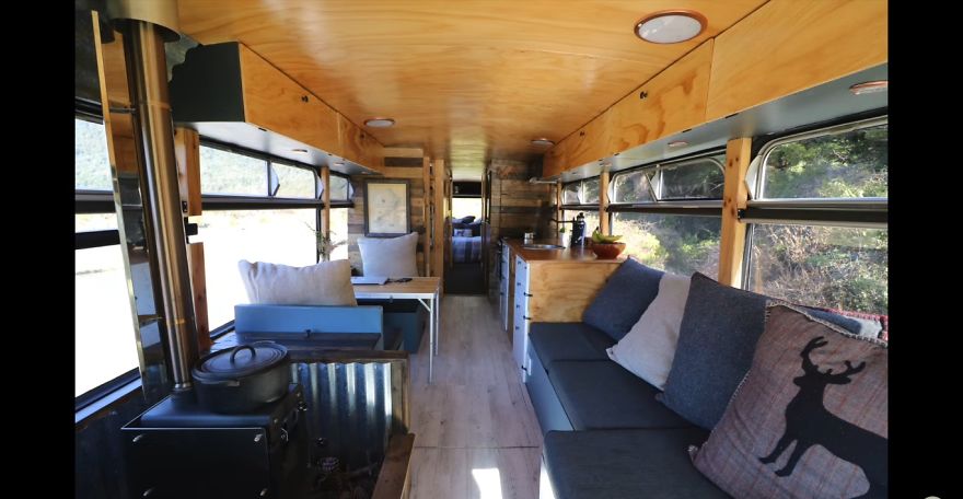 This Inspiring Couple Quit Their 9-5 Jobs To Live & Travel In A DIY Off-Grid School Bus Conversion