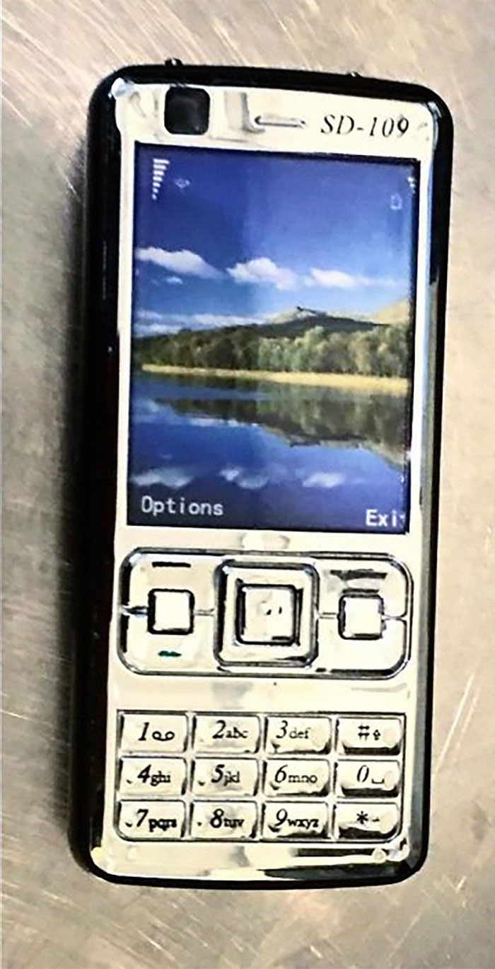 Does This Phone Look Suspicious To You? Well, Besides The Fact That Borat And Idiocracy Were Still In Theaters When This Style Of Phone Was Popular, There’s Something Else Strange About It. It’s A Stun Gun With Shockingly Good Reception!