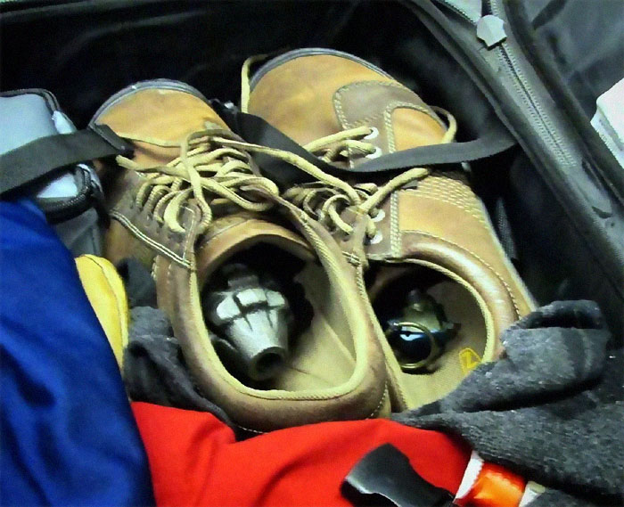 Most Travelers Stuff Socks In Their Shoes. This Milwaukee (Mke) Traveler Chose Inert Grenades