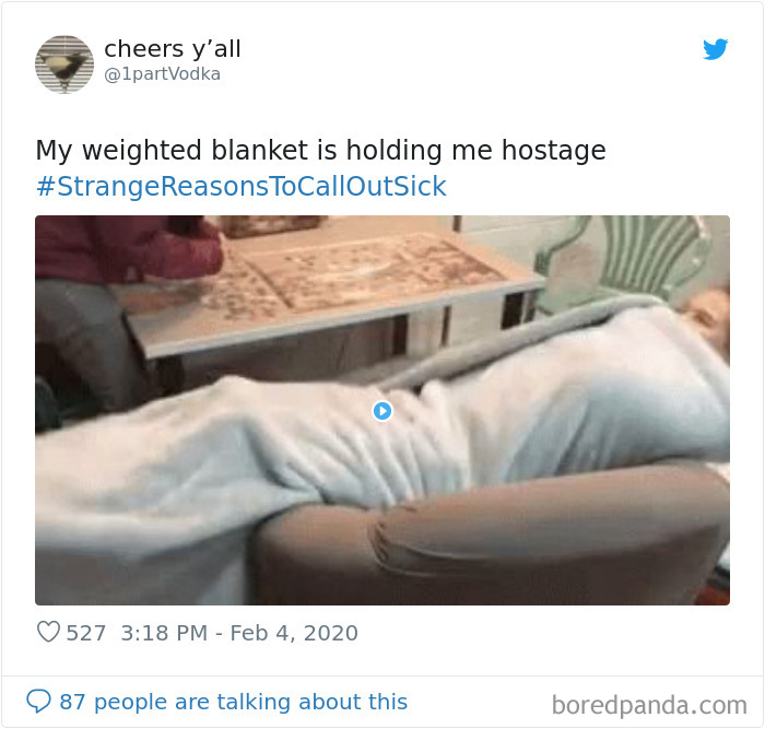 Person wrapped tightly in a weighted blanket, humorously illustrating a strange reason to call in sick.