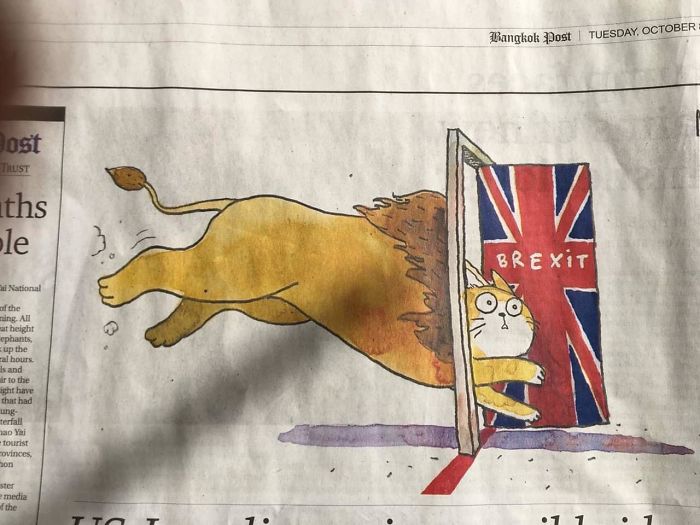 Cartoon lion leaping through a union flag door labeled Brexit, creating a humorous scene.