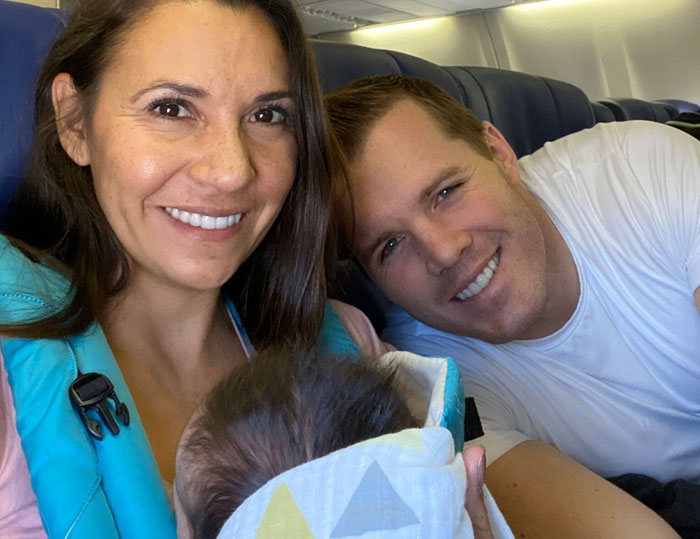 Couple Flies Home With Newly Adopted Baby And Passengers Decide To Throw Them An Impromptu Baby Shower