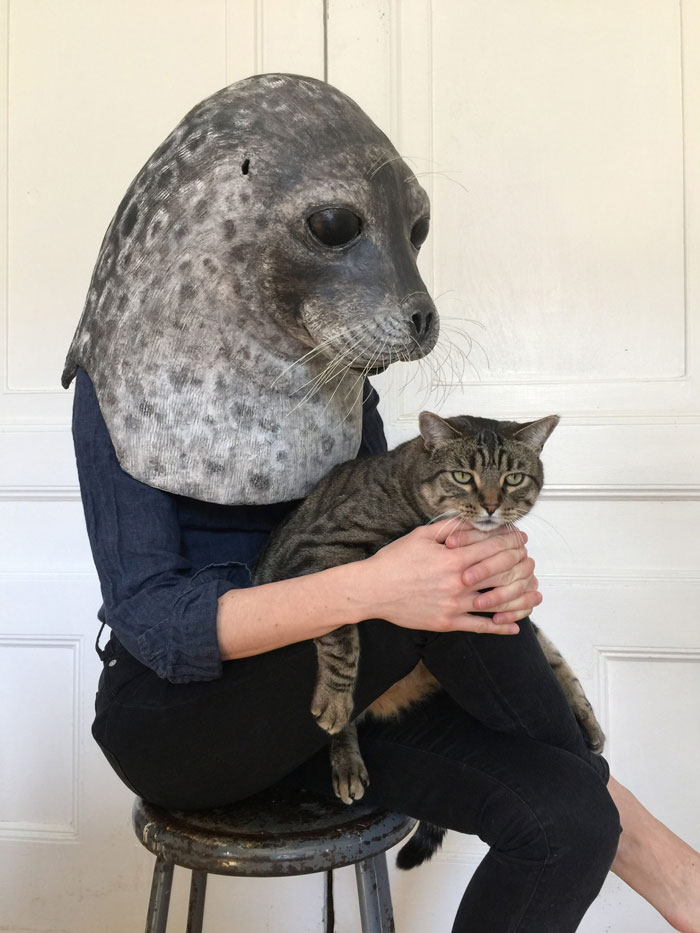 Artist Creates Realistic Animal Masks And Poses With Them In Ordinary Urban Areas