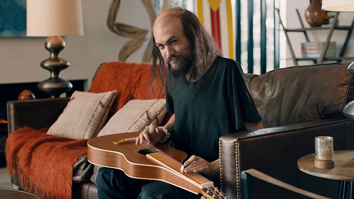 Balding Jason Momoa Takes Off His Muscles In A Freaky Super Bowl Ad Balding Jason Momoa Takes Off His Muscles In A Freaky Super Bowl Ad