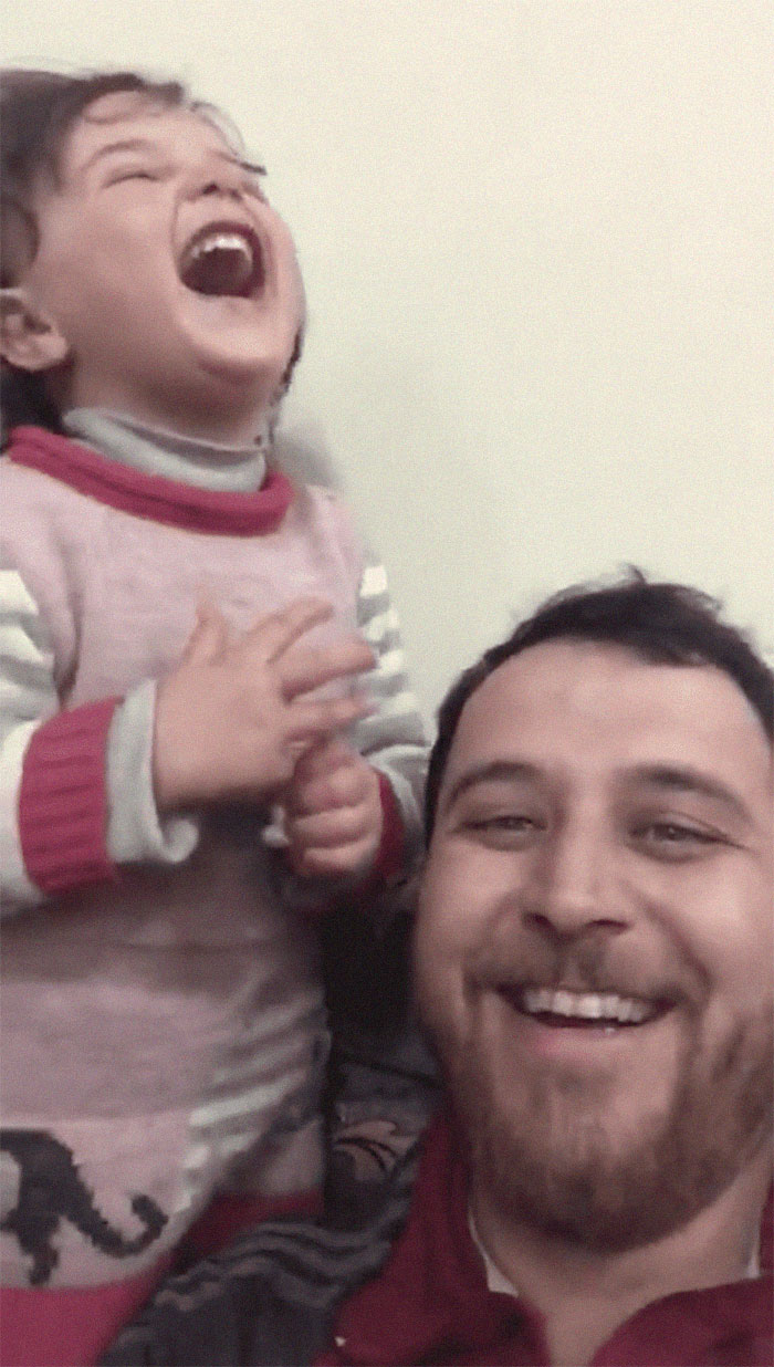 Syrian Dad Tells Daughter To Laugh When Bombs Explode In A Heartbreaking Video