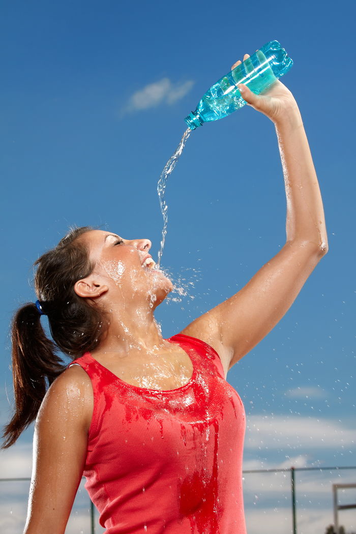 Women-Dont-Know-How-To-Drink-Water-Stock-Photos