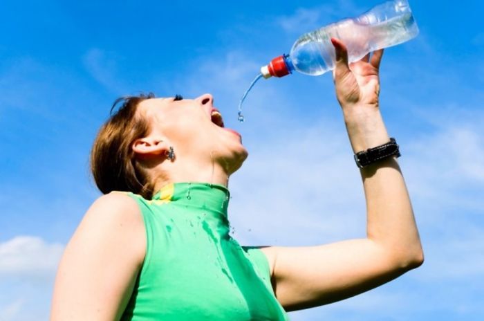 Women-Dont-Know-How-To-Drink-Water-Stock-Photos