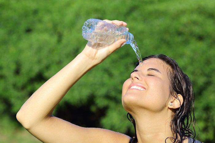 Women-Dont-Know-How-To-Drink-Water-Stock-Photos