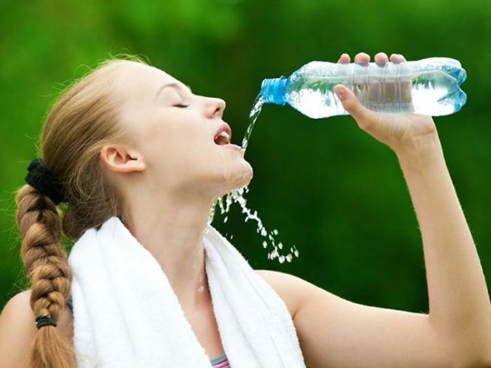 Women-Dont-Know-How-To-Drink-Water-Stock-Photos