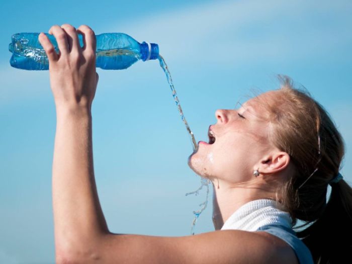 Women-Dont-Know-How-To-Drink-Water-Stock-Photos