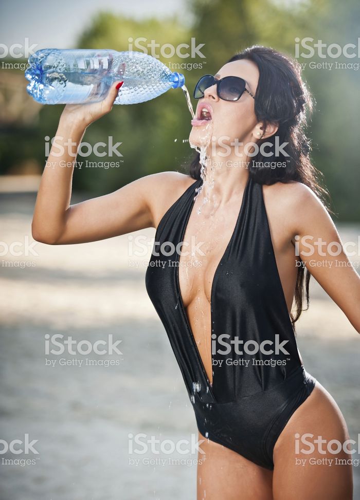 Women-Dont-Know-How-To-Drink-Water-Stock-Photos