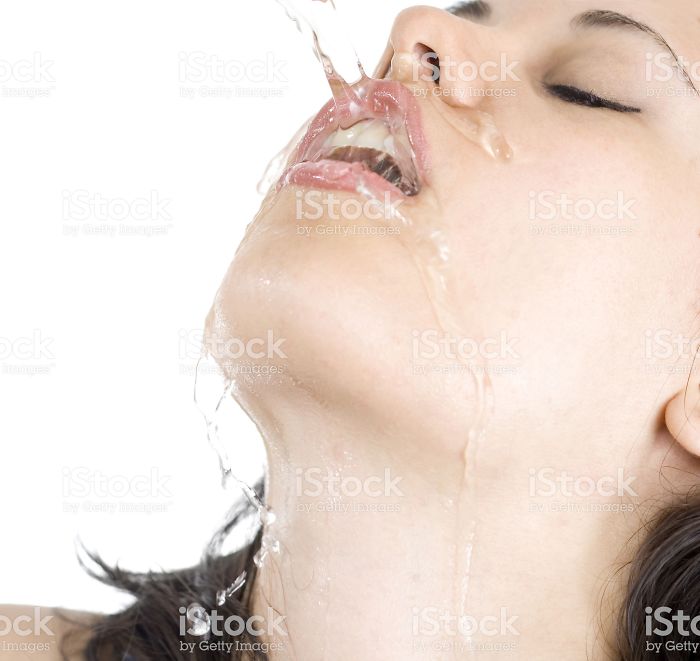 Women-Dont-Know-How-To-Drink-Water-Stock-Photos