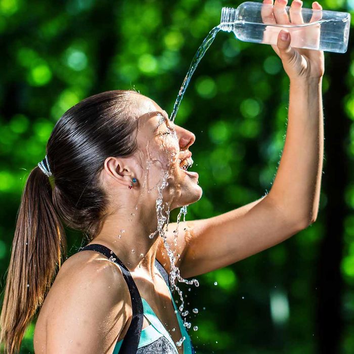 Women-Dont-Know-How-To-Drink-Water-Stock-Photos