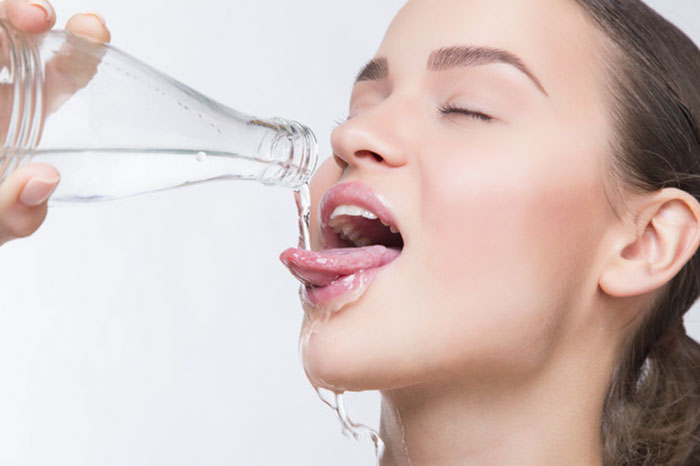 Women-Dont-Know-How-To-Drink-Water-Stock-Photos
