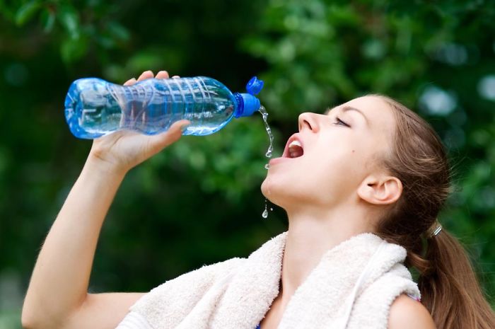 Women-Dont-Know-How-To-Drink-Water-Stock-Photos