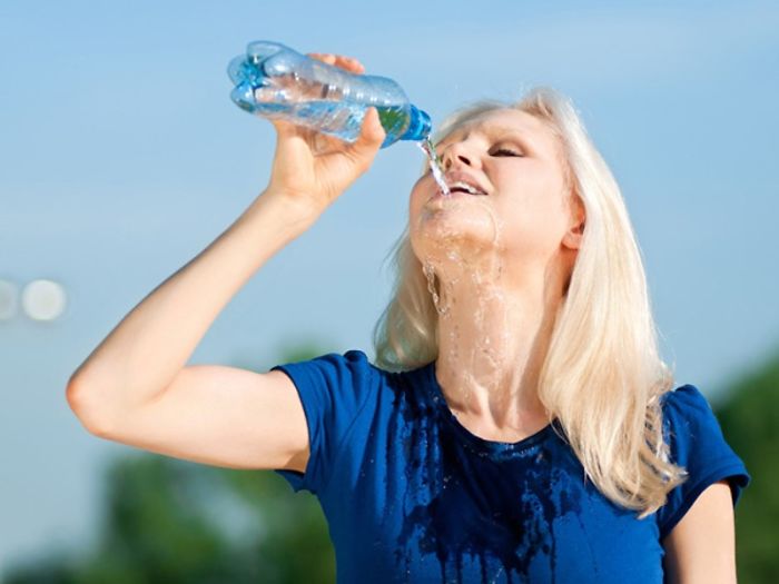 Women-Dont-Know-How-To-Drink-Water-Stock-Photos