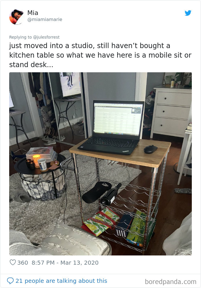 Mobile sit or stand desk workspace setup in a home studio showing a laptop and everyday clutter for realistic work from home environment.