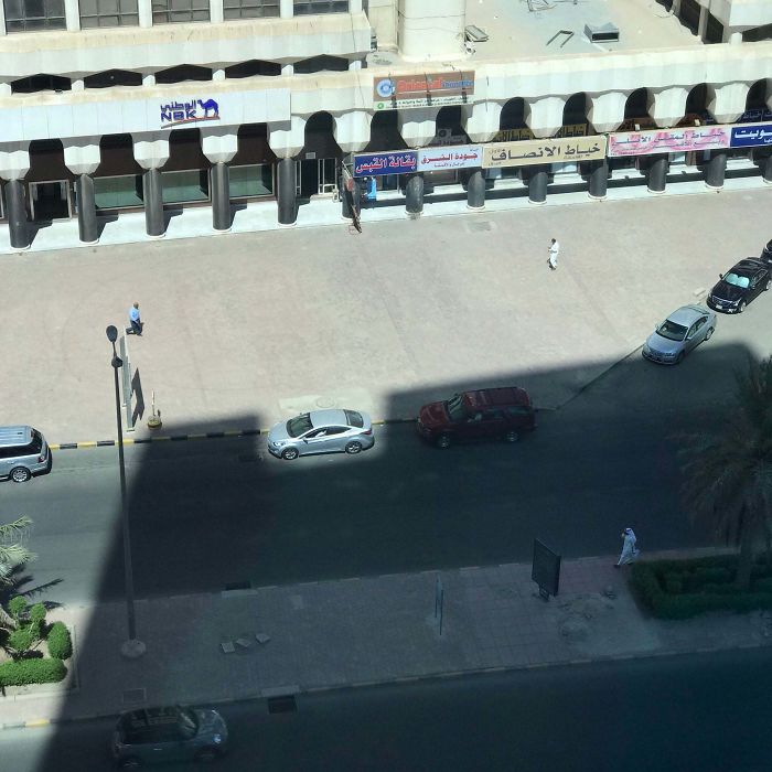 The Light Opening In The Building's Design Fits Perfectly With The Car Dimension