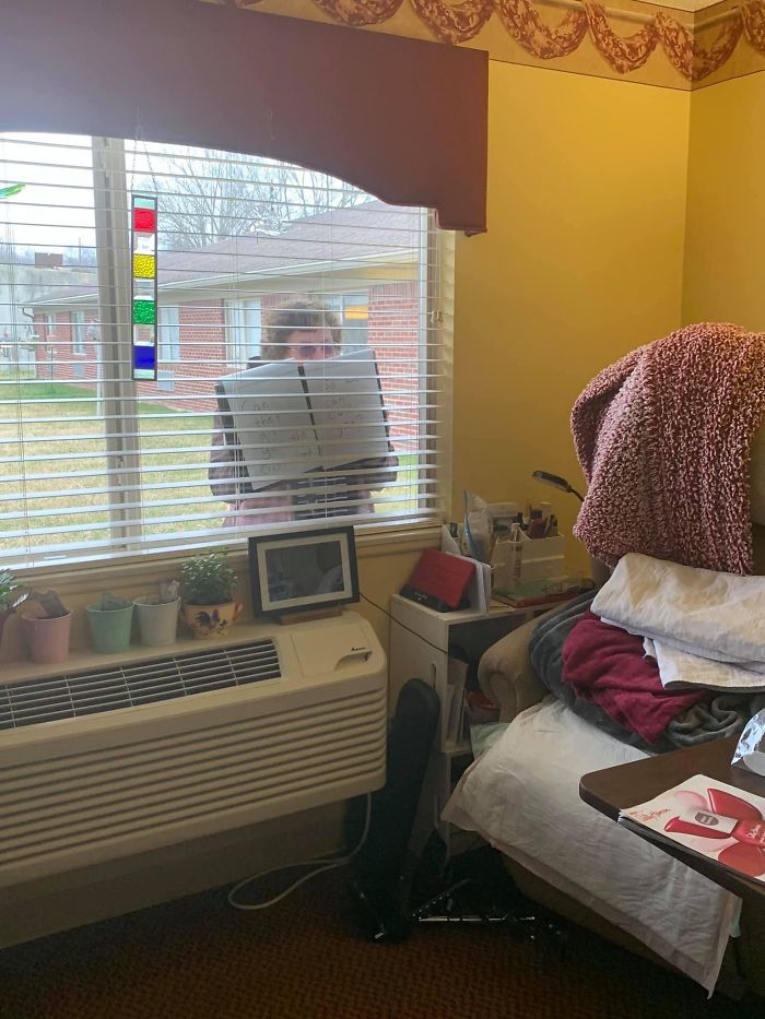 A Patient’s Daughter Writing Messages To Her Mom During The Visitor Ban Amidst The Corona Outbreak