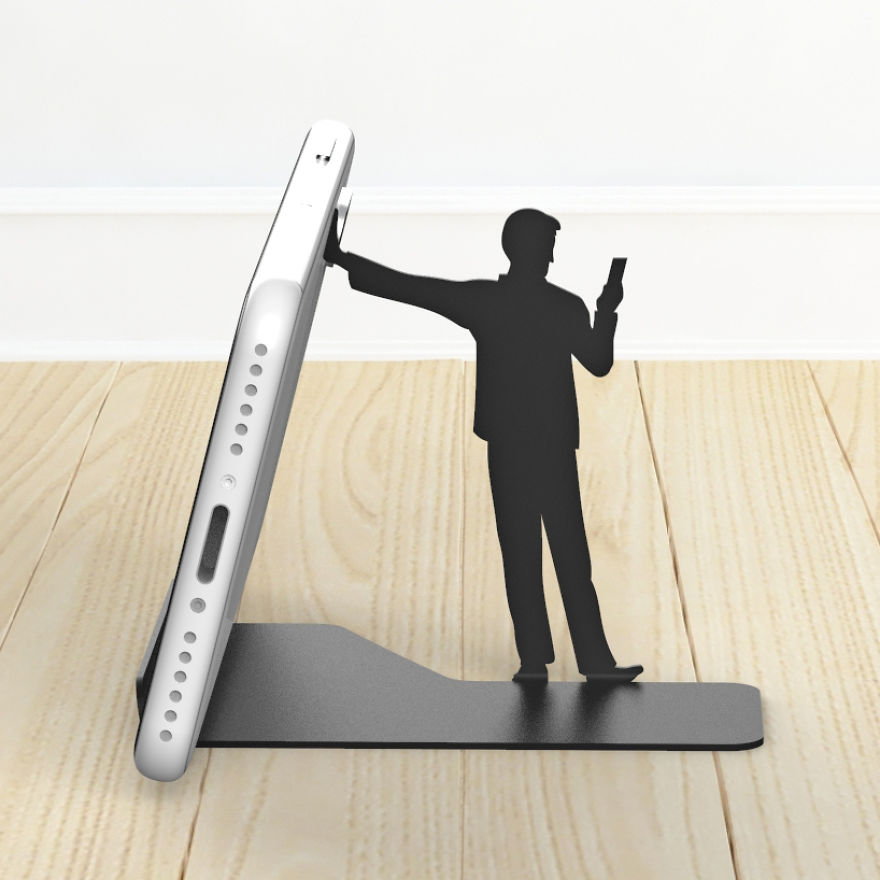 I Designed A Humorous Cell Phone Stand With Human Figures Holding Your Phone, But In Fact They’re Mostly Busy With Their Own Cell Phone! I Designed A Humorous Cell Phone Stand With Human Figures Holding Your Phone, But In Fact They’re Mostly Busy With Their Own Cell Phone!