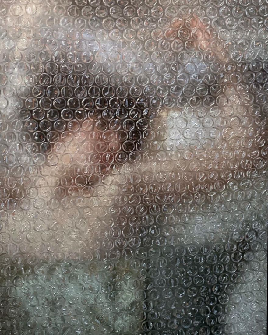 Artist Paints Portraits That Look Like They're 'Wrapped' In Bubble Wrap
