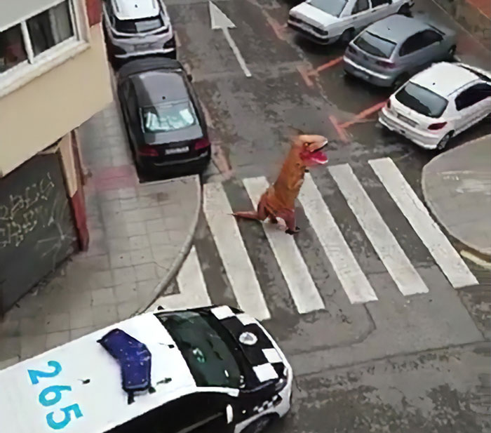 Police Caught A Man Outside In T-Rex Costume During Spain&rsquo;s Coronavirus Lockdown