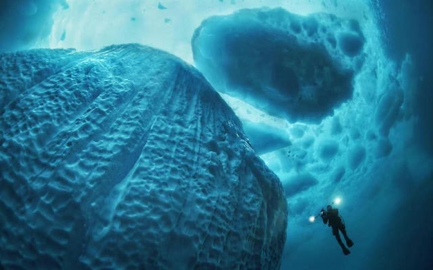 Photographer Takes Incredible Pictures Of Greenland's Underwater Icebergs