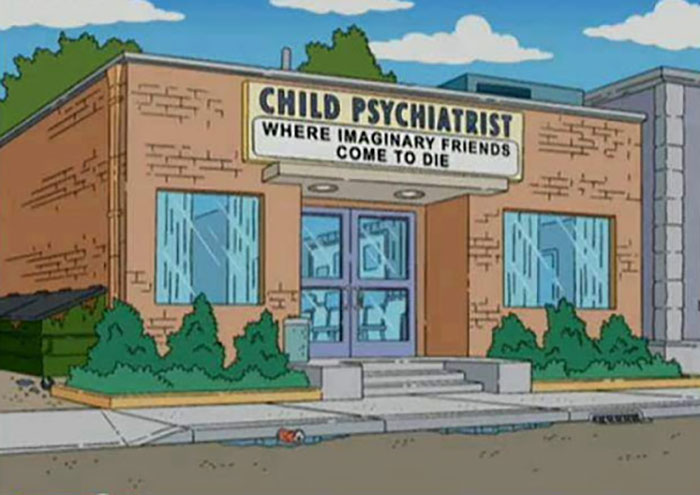 Witty sign on a brick building in The Simpsons reading child psychiatrist where imaginary friends come to die