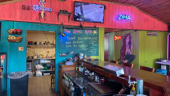 Bar Owner Removes $3,714 Worth Of Bills Stapled To The Walls To Pay Unemployed Staff