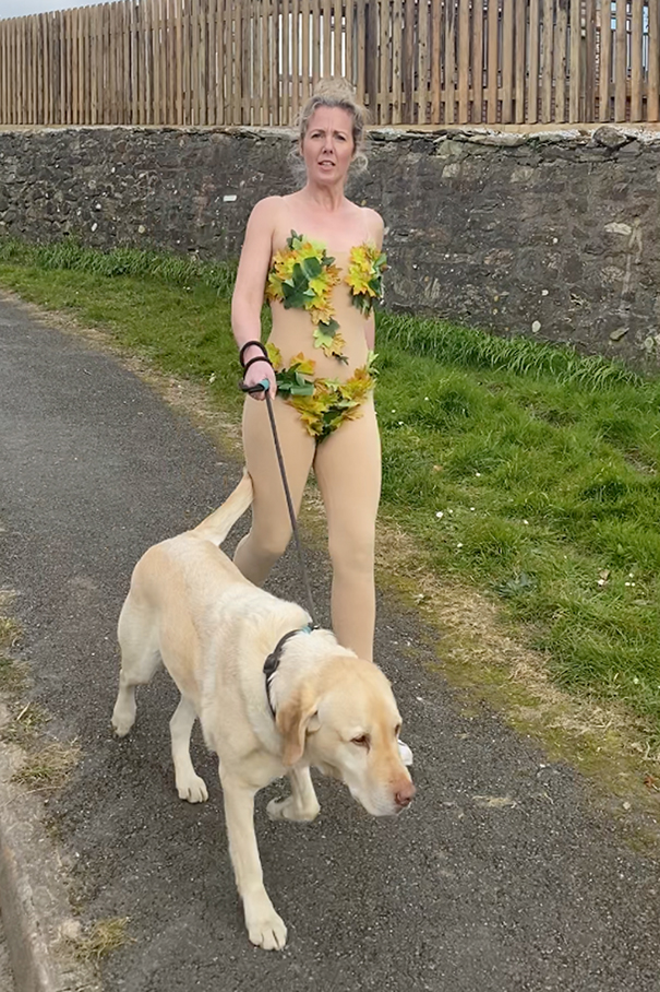 Woman Wears Bizarre Costumes While Walking Her Dog During The Quarantine And He Looks Embarrassed (8 Pics) Woman Wears Bizarre Costumes While Walking Her Dog During The Quarantine And He Looks Embarrassed (8 Pics)