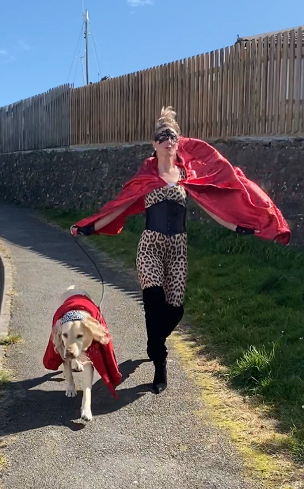 Woman Wears Bizarre Costumes While Walking Her Dog During The Quarantine And He Looks Embarrassed (8 Pics) Woman Wears Bizarre Costumes While Walking Her Dog During The Quarantine And He Looks Embarrassed (8 Pics)