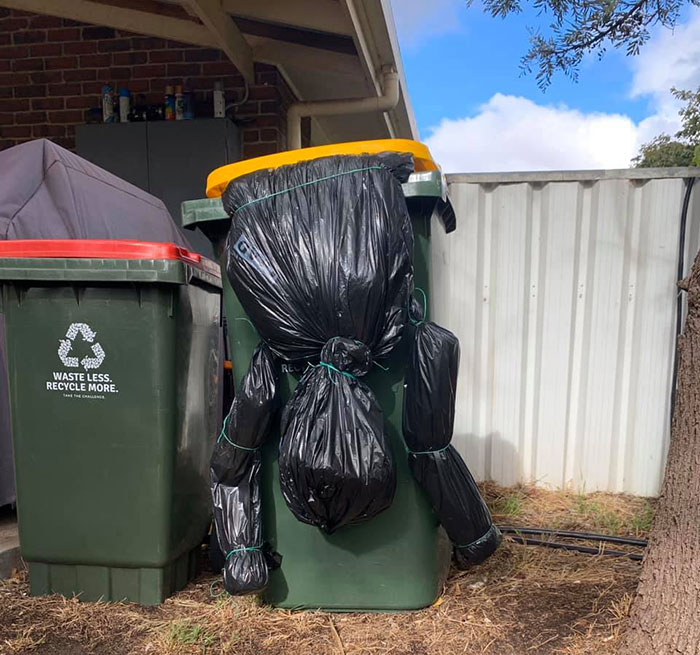 Australians-Dress-Up-Taking-Bins-Out